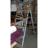 A metal and wood step ladder.