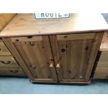 A solid pine 2 door cupboard computer desk