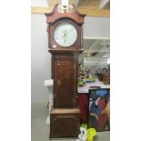 An oak cased Grandfather clock marked I Mawkes, Derby and dated Oct. 30 03.