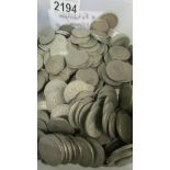 A large quantity of UK coins, 6d, 1/-, 2/- and 2/6.