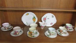 A 22 piece Paragon "World Famous Roses" tea set, all in good condition.