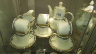 A Royal Doulton Albany pattern coffee set (missing sugar bowl) (Collect only)