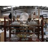 4 glass decanters, a glass head,