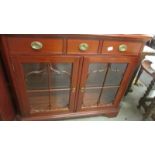 A good quality modern mahogany astragal glazed cabinet.