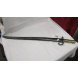 An old bayonet with brass hilt, No. S29940.