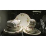 An Aynsley floral patterned tea set (missing sugar bowl) with an odd sandwich plate.