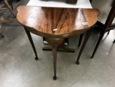 An Edwardian dark wood hall table on 3 Queen Anne legs (71cm x 37cm x 73cm high)