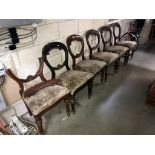 A set of 6 Victorian balloon back dining chairs