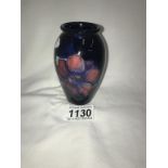 A Moorcroft vase ****Condition report**** No damage. Height 10.
