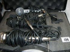 Five microphones in case.