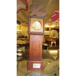 A pocket watch stand in the form of a long case clock.