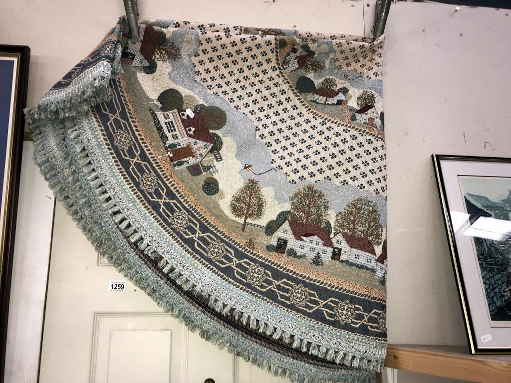 A large round tapestry style wall hanging/table cloth (diameter 190cm approximately)