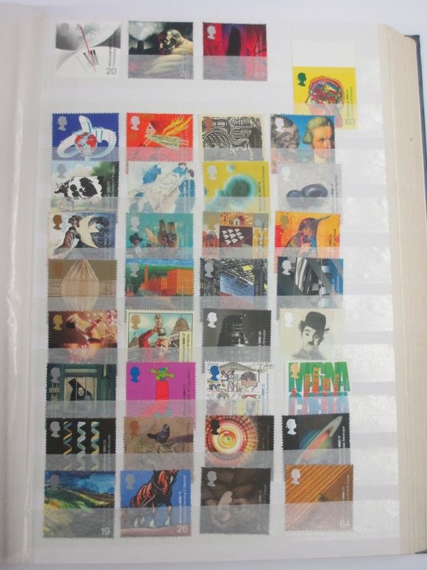 A good album of mint definitive stamps and sets (some in strips, many with gutter sides), - Image 9 of 13