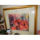 A gilt framed signed print of poppies.