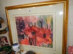 A gilt framed signed print of poppies.