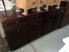 A Nathan dark wood stained 2 drawer, 4 door sideboard, 165 x 46 x73 cm high.