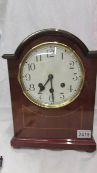 An 8 day chiming bracket clock, springs ok but chimes need attention.