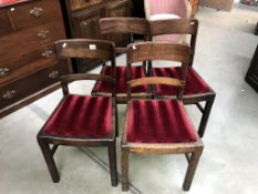 A set of 4 dark oak dining chairs