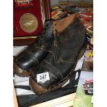 A pair of vintage steel toecap boots.