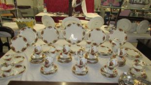 Approximately 90 pieces of Royal Albert Old Country Roses tea and dinner ware (Four side plates