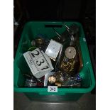 A box of miscellaneous including clock.