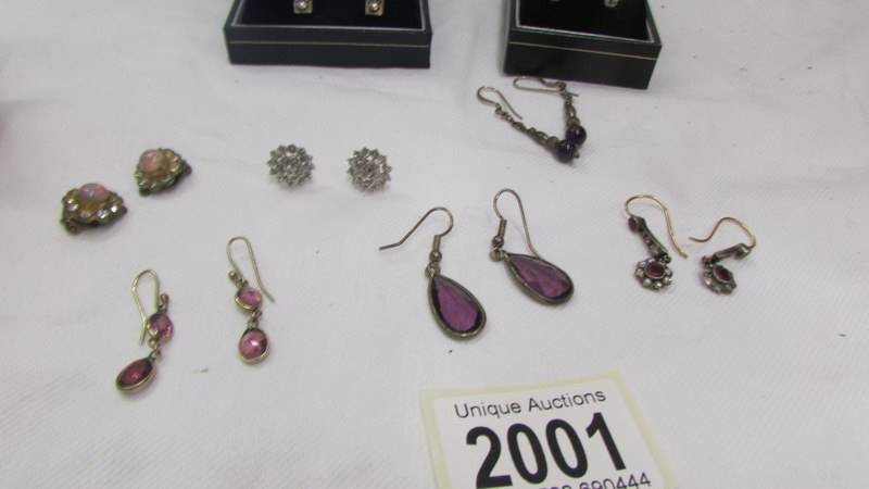 Two pairs of silver earrings and six other pairs of earrings. - Image 3 of 3