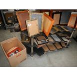 A large lot of photo frames.