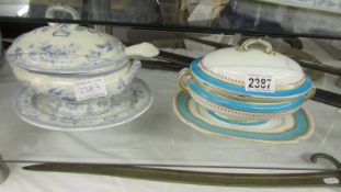 A Royal Worcester sauce tureen and a blue and white sauce tureen with ladle.