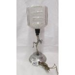 An art deco chrome figurine table lamp complete with shade.