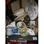 A box of collectable china.