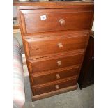 A five drawer chest.