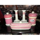 2 pink lidded jars,