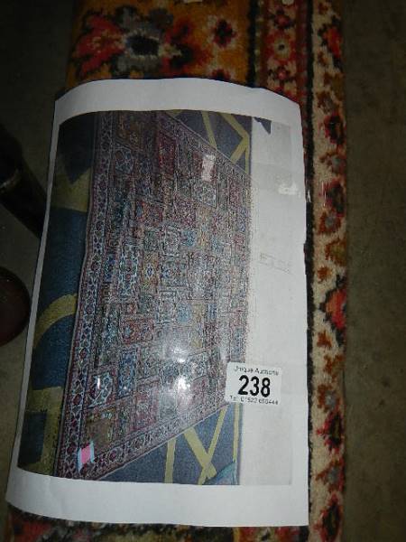 A large carpet 8'6" x 7'6",