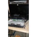 A Phillips TV, A CD player and quantity of video's,
