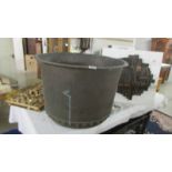 A large copper cauldron. (collect only) ****Condition report**** Outer rim 68cm.