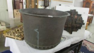 A large copper cauldron. (collect only) ****Condition report**** Outer rim 68cm.