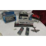 A quantity of die cast models including boxed Aston Martin DB5, Jaguar E Type etc.