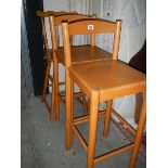 Three pine kitchen stools.