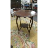 A mahogany pie crust edge table.