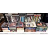 A large quantity of CD's including quantity of compilation film DVD's