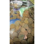 A large quantity of UK copper coins.