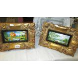 A pair of oil on copper colourful landscape scenes in ornate gilt frames.