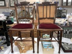 A pair of Edwardian mahogany hall chairs