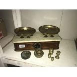 A set of Victorian inlaid mahogany shop scales with marble shelf & brass pans by PARNALL & Sons,