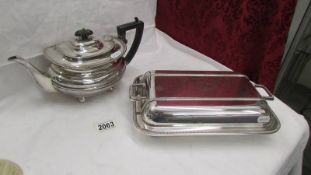 A silver plate teapot and a silver plate tureen.