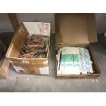 A large quantity of beer mats & quantity of cigarette boxes & wrappers