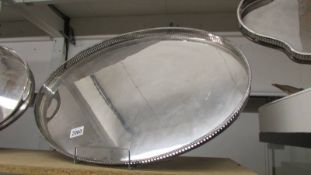 An oval silver plate gallery tray, 62 x 43 cm.