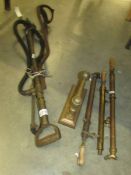 Four old brass garden pumps.