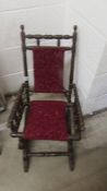 A Victorian child's American rocking chair.