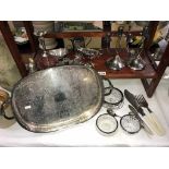 A large quantity of silver plate items including candlesticks, tray & silver napkin rings etc.